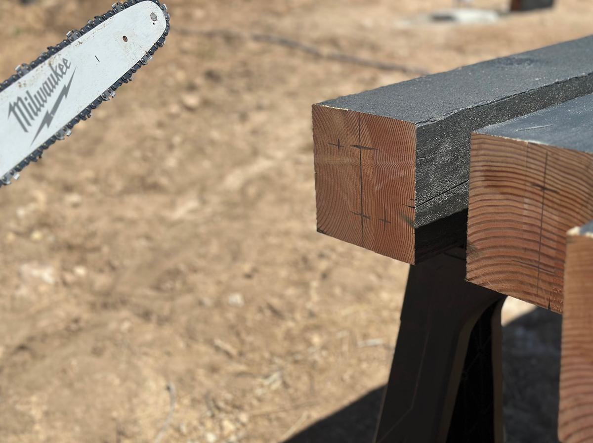 Fresh-cut ends of Slate-stained fir beams on site in Lehi, Utah, solid timber under the stain